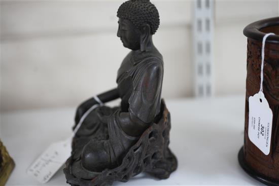 A Chinese bronze seated figure of Buddha Shakyamuni, 18th/19th century, total height 18.5cm